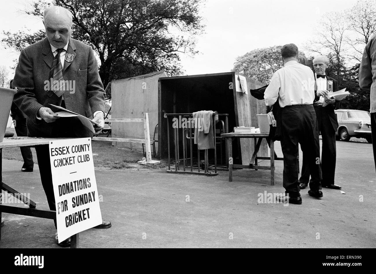 For the first time County cricket was played on a Sunday. The match between Essex and Somerset took place at Valentine's Park in Ilford. Picture shows: No charge for entrance on a Sunday so fans are asked 2/6 for a teamsheet and a contribution in the bucket. 15th May 1966. Stock Photo