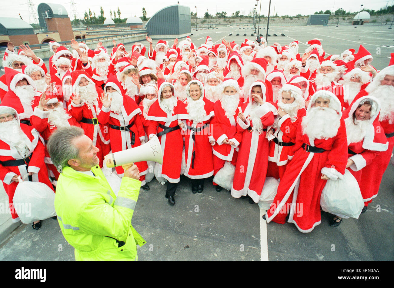 100 Father Christmas's, Photocall to open new multi storey carpark at Lakeside Shopping Centre, 14th October 1993. Stock Photo