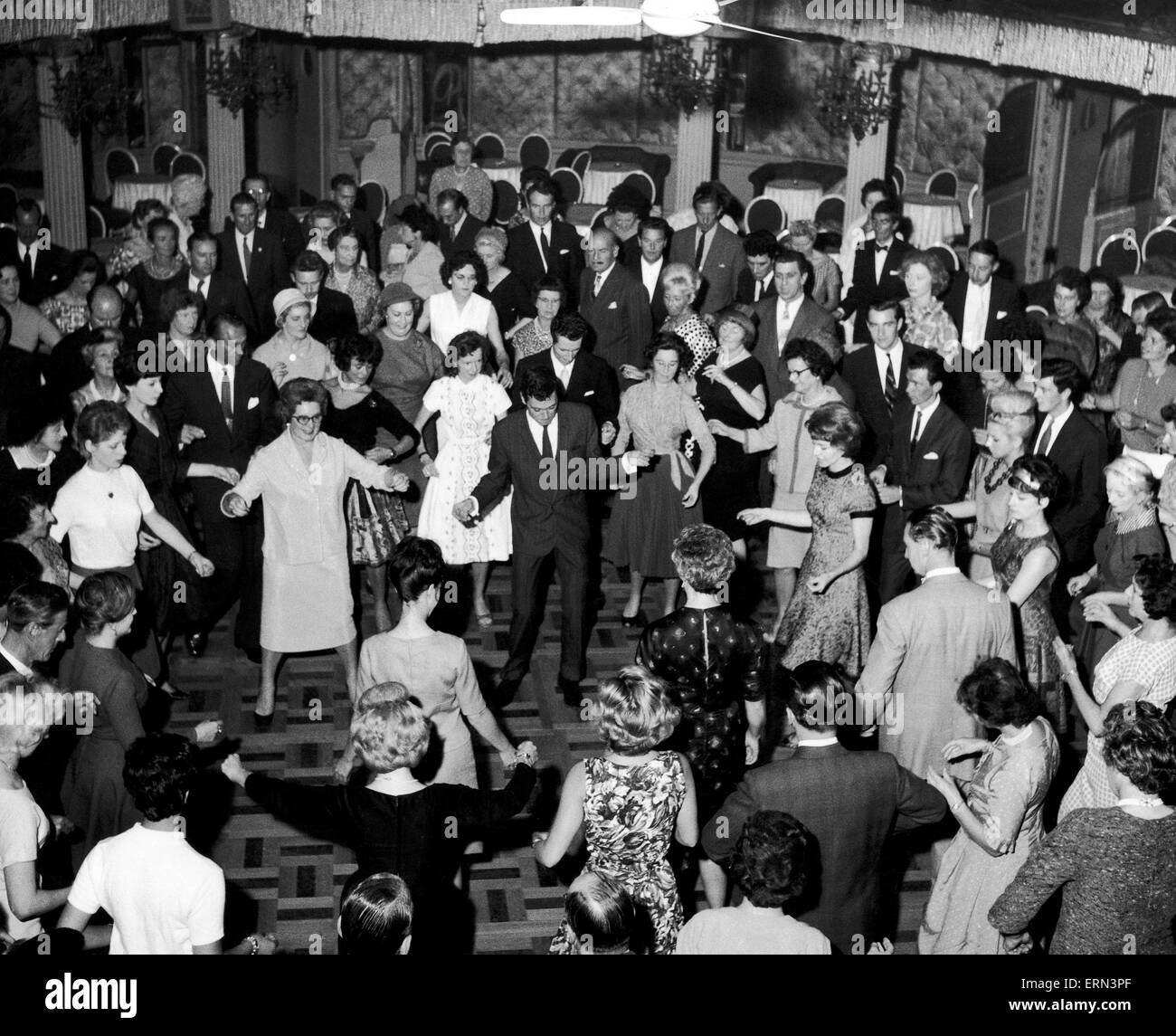 Scene at Cafe de Paris as Lionel Blair demonstrated the New Madison and visitors joined in.  THe New Madison can be danced to jive at 34 or 36 bars per minute. FInger snapping and clapping are a feature of the dance. Four movements are the basis of the dance. 27th September 1962. Stock Photo