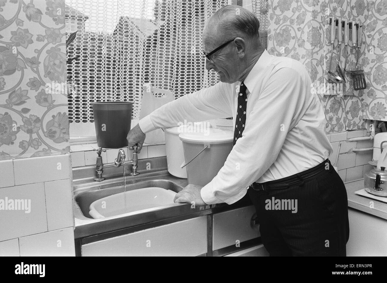 Elderly running tap Black and White Stock Photos & Images Alamy