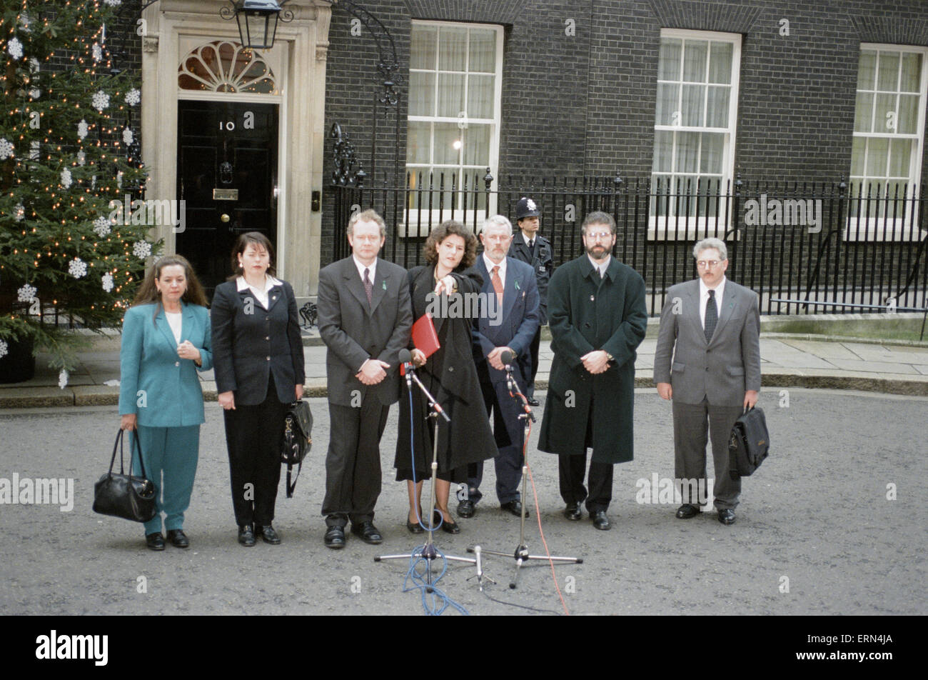 Sinn Fein leader Gerry Adams flanked by his party deputies faces the media outside Number 10 Downing Street before the peace talks with the Prime Minister Tony Blair. In the picture are Martin McGuinness  (third left), Gerry Adams spokeswoman Lucilita Bhreatnach (centre), Martin Ferris (third from the right) and  Gerry Adams (second right). 11th December 1997. Stock Photo