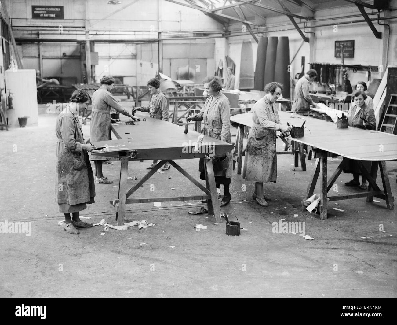 Women workers doping the wings during the construction of the Miles 3 Falcon aircraft at the Philips and Powis factory at Woodley Aerodrome, Reading  2nd April 1934 Stock Photo