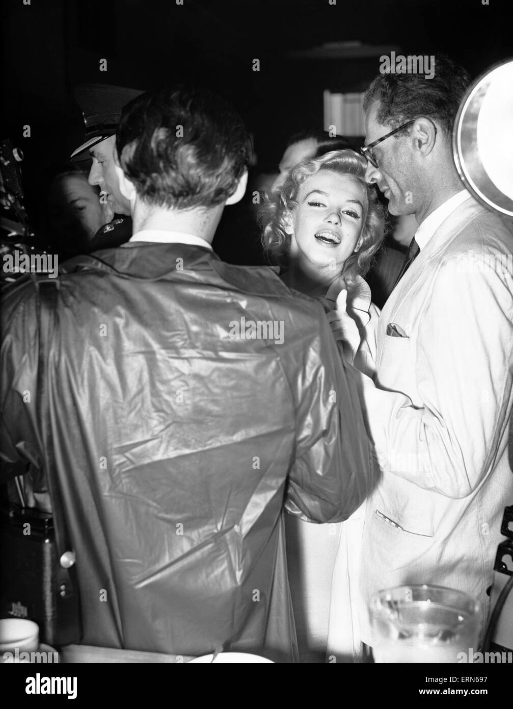 Marilyn Monroe, and husband, playwright Arthur Miller, in London to be 'officially presented' by her new leading man, Sir Laurence Olivier at press conference held at the Savoy Hotel, London, Sunday 15th July 1956. Stock Photo