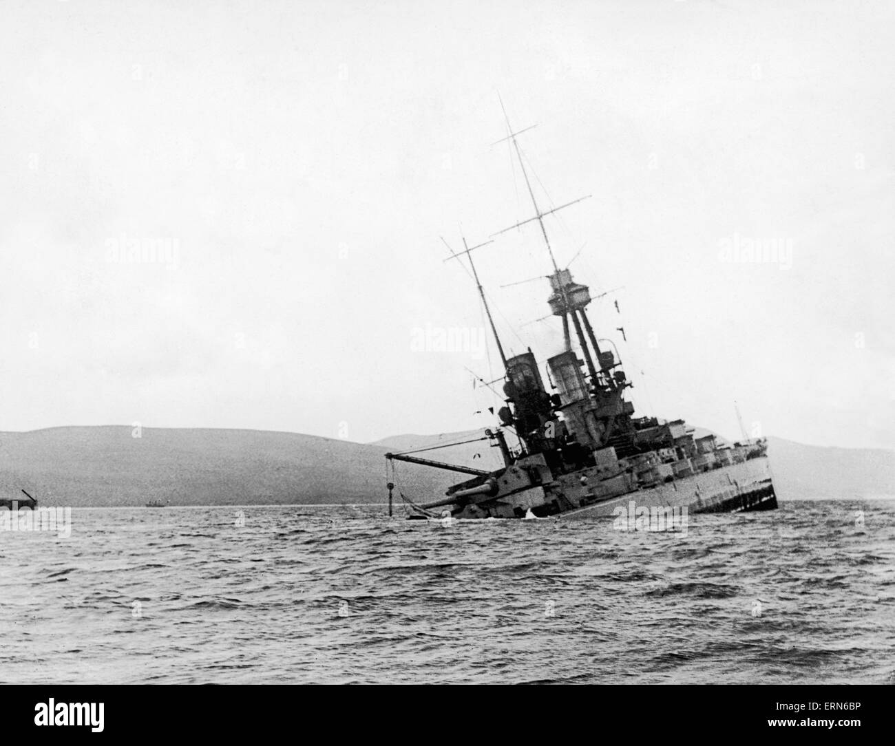 The battleship SMS Bayern of the German Imperial Fleet  seen here sinking by the stern on the morning of the 21st June 1919 shortly after the crew had opened the seacocks to scuttled the ship. The SMS Bayern along with the rest of the German High Sea Flee Stock Photo