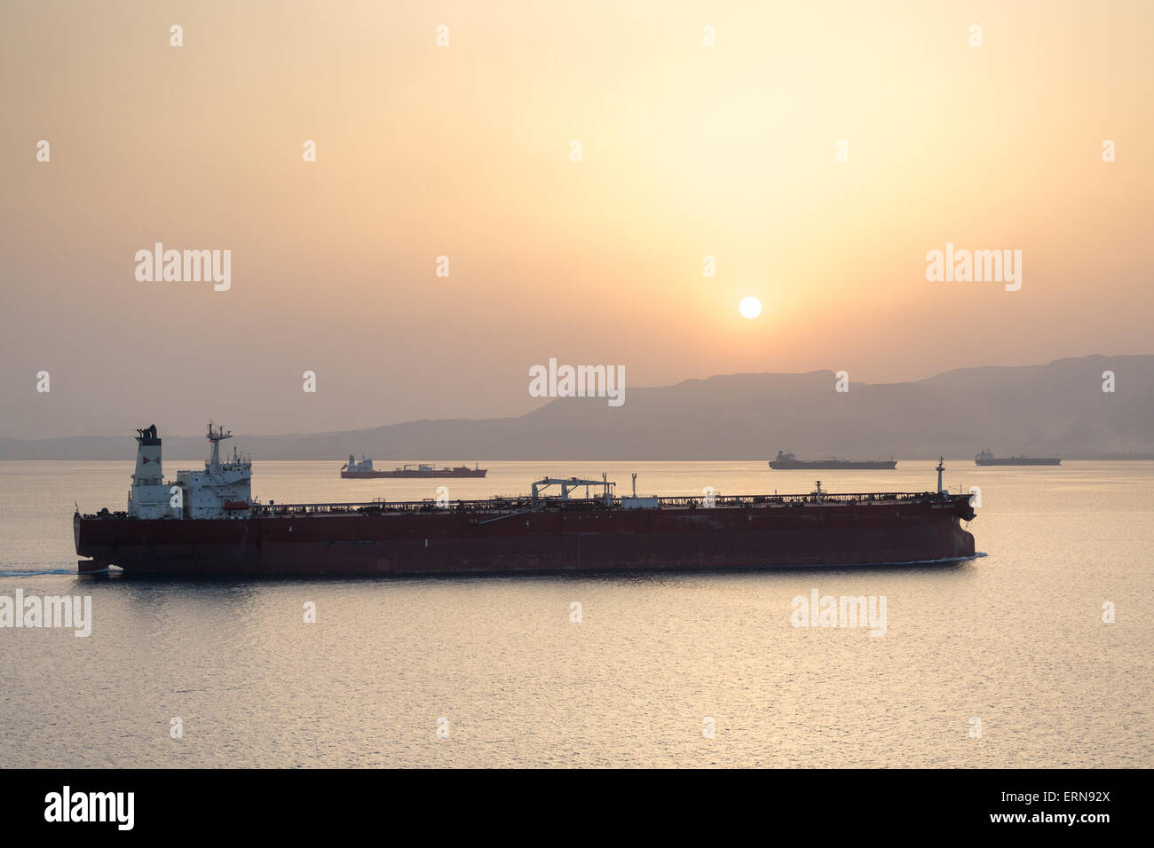 Ships gathering for night convoy through Suez canal. Red Sea Egypt. Stock Photo