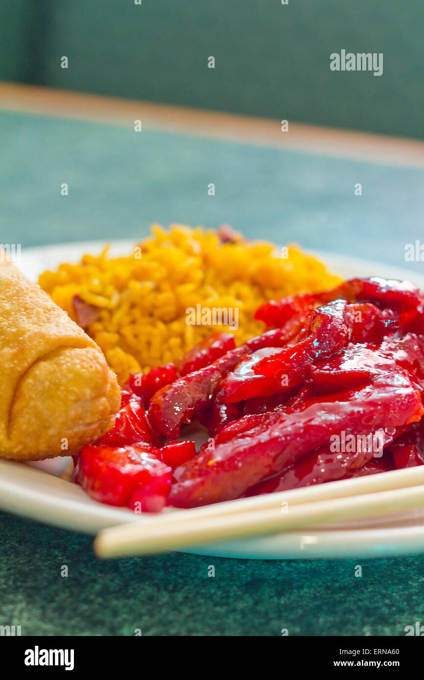 Chinese boneless bbq spare ribs with egg roll and pork fried rice Stock ...