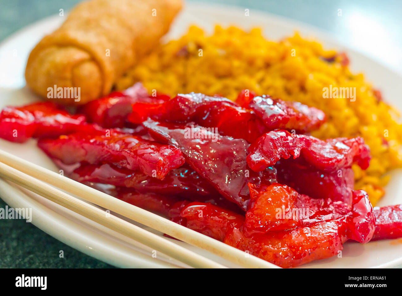 Chinese boneless bbq spare ribs with egg roll and pork fried rice Stock