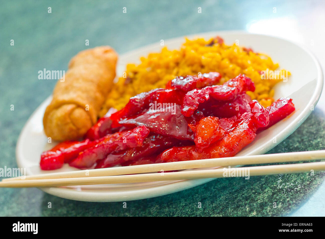 Chinese boneless bbq spare ribs with egg roll and pork fried rice Stock