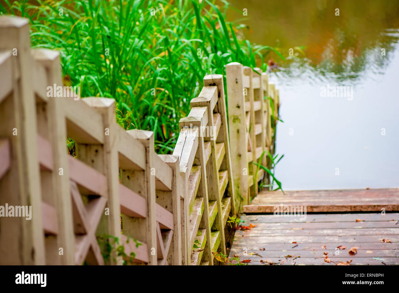 Railing fence wooden bridge in hi-res stock photography and images - Alamy