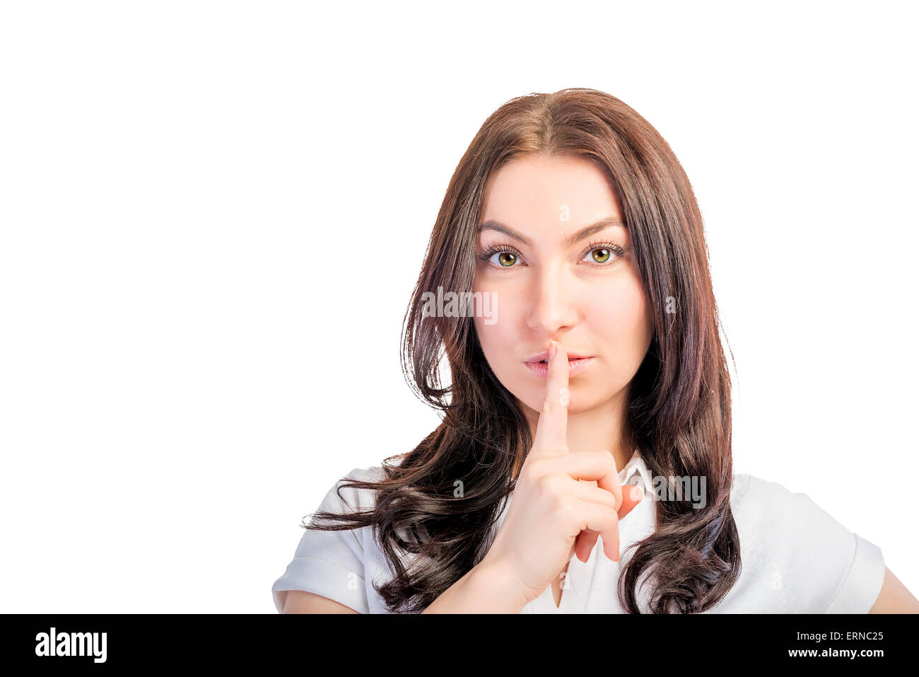 closeup portrait of a girl with finger on lips Stock Photo - Alamy