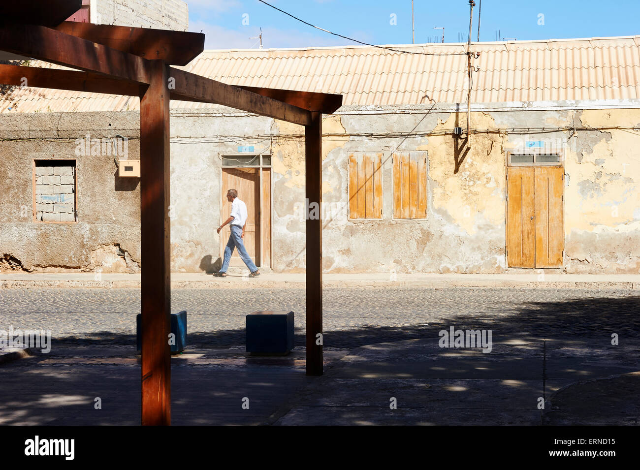A an walks down the street in Sal's town center, Cape Verde Stock Photo