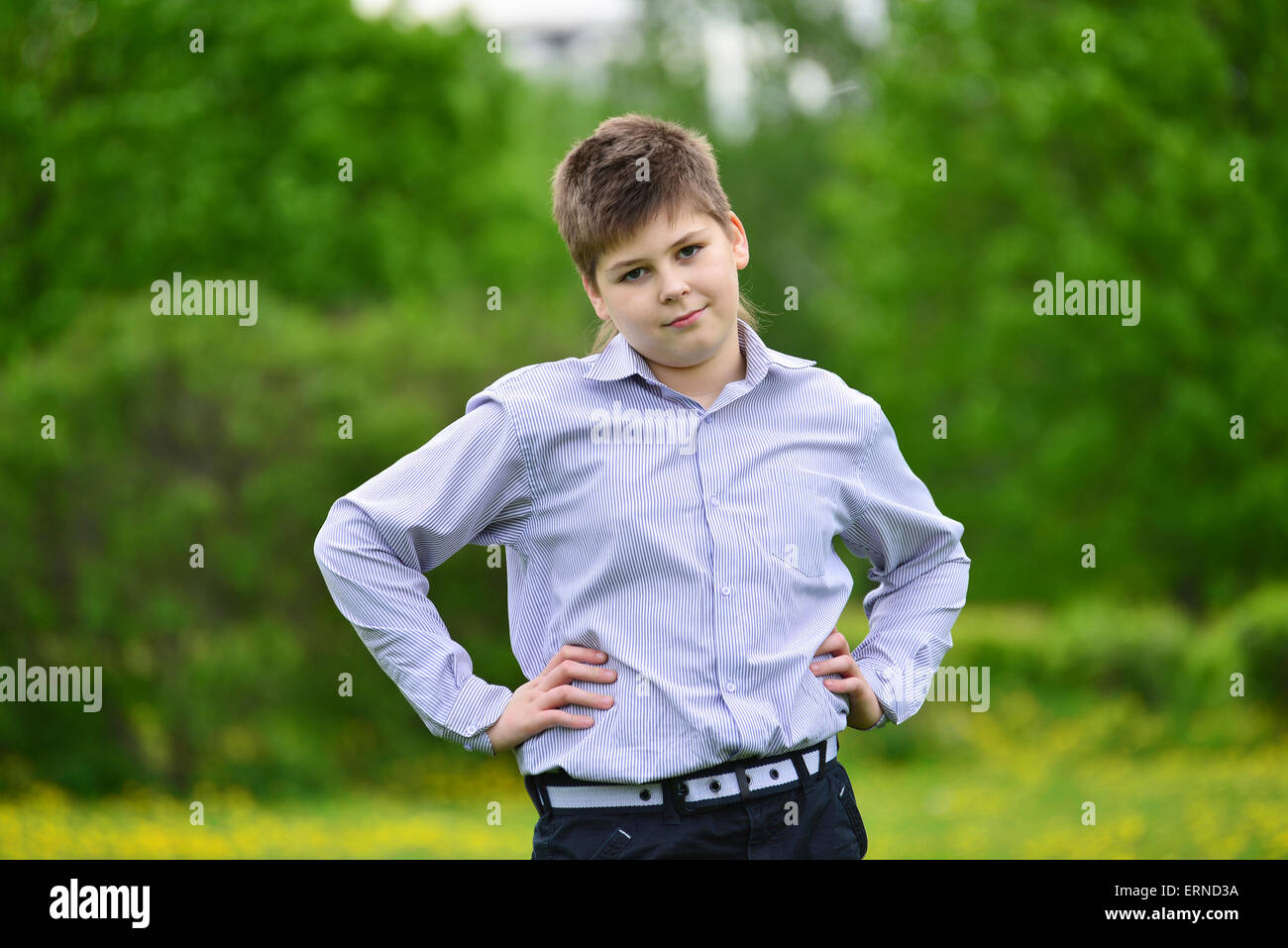 A teenager Boy in the spring park Stock Photo - Alamy