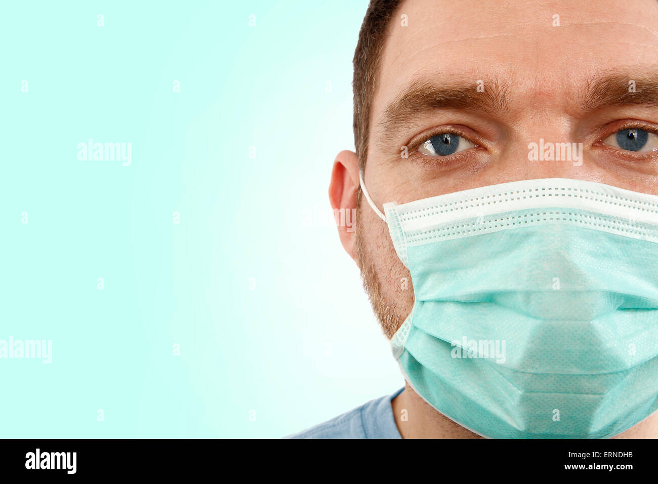 Closeup of a doctor with green mouth guard Stock Photo