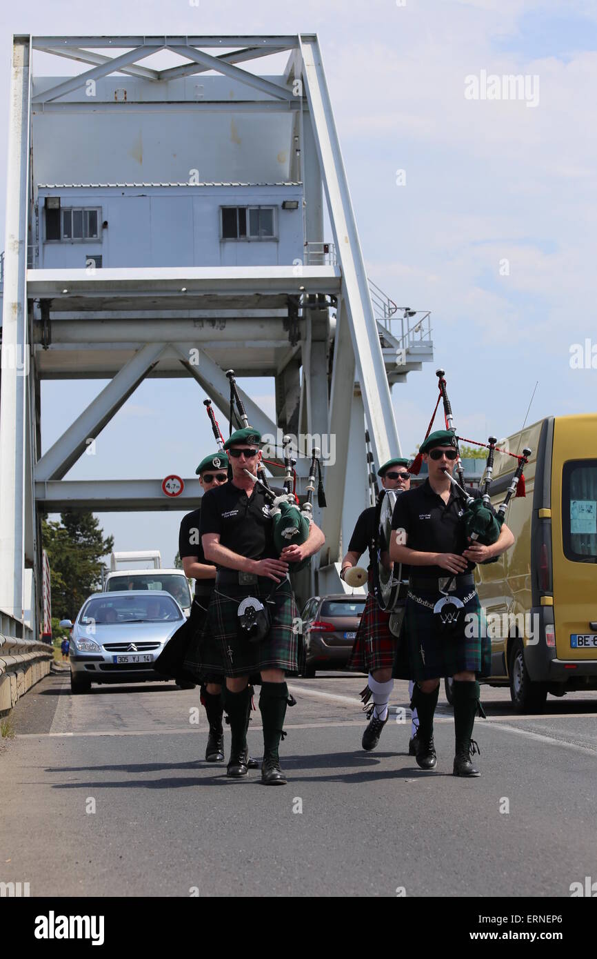 DDay 71st Anniversary, Normandy France. 5th June 2015. A bagpipe band