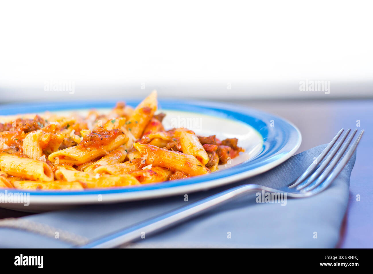 Penne pasta with ground beef meat sauce Stock Photo Alamy