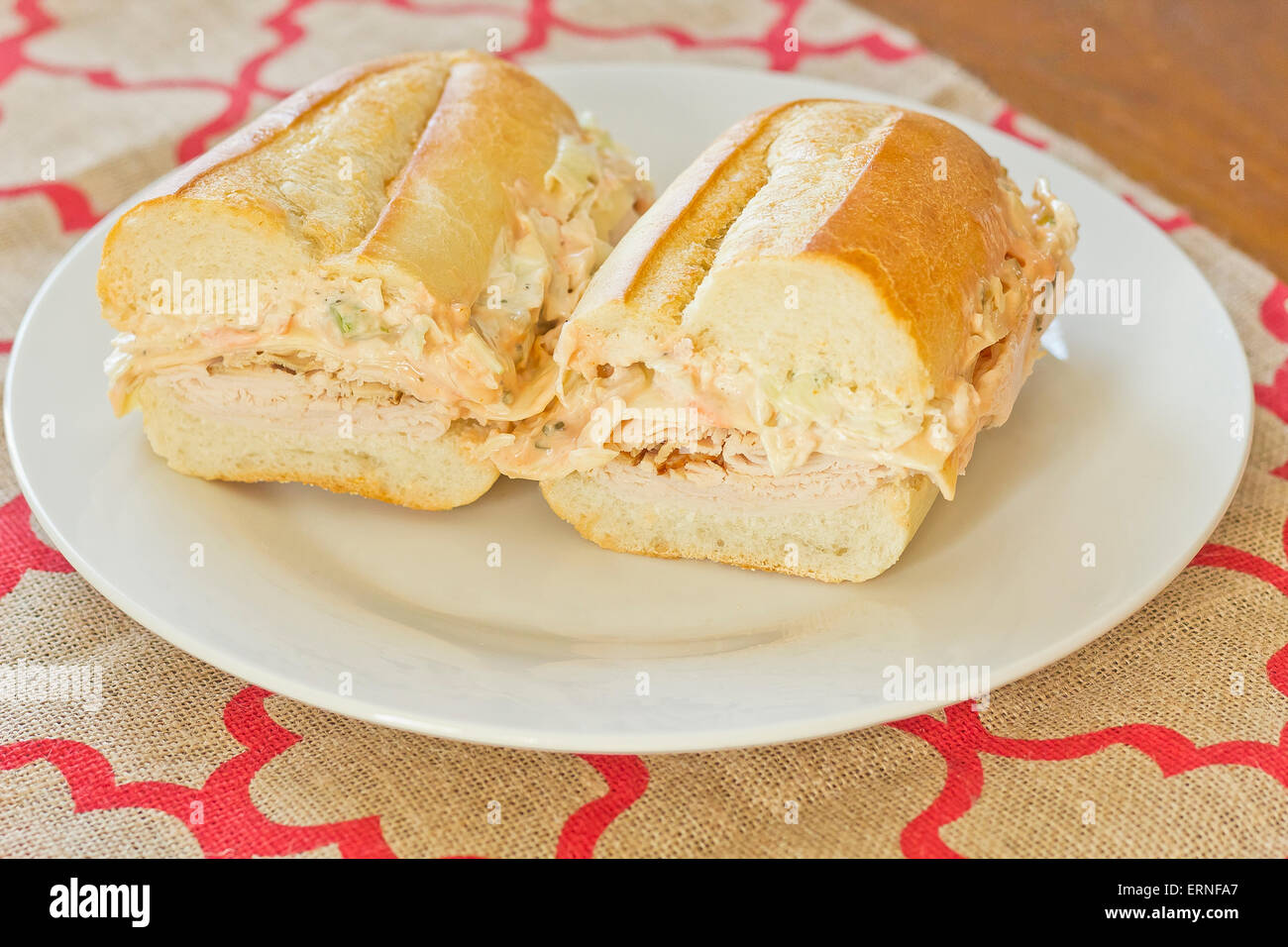Healthy alternative, turkey reuben on a torpedo roll with cole slaw