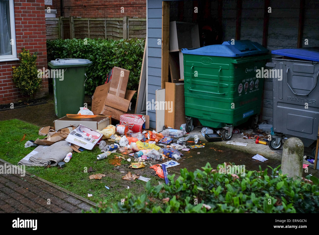 Overflowing bins in flat shared bins Stock Photo