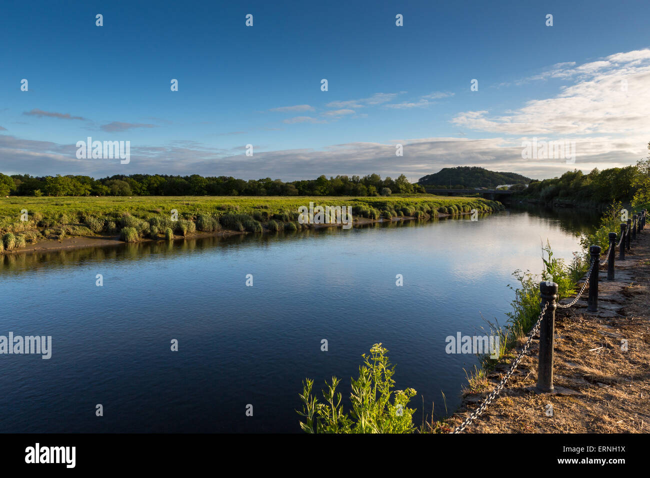 The River Tywi (Towy) at Caerfyrddin / Carmarthen, looking west on a calm, peaceful evening Stock Photo