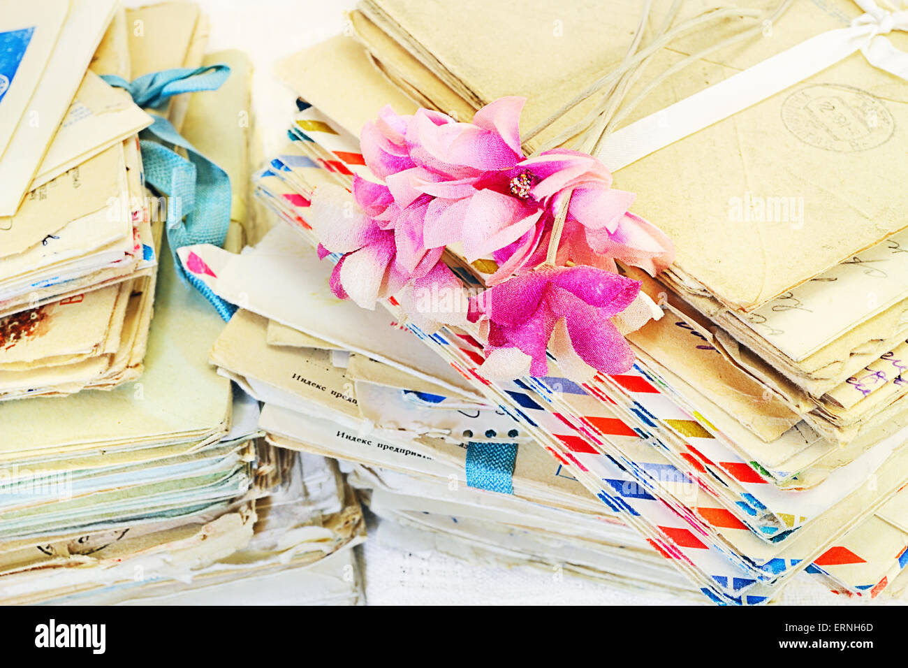 Vintage artificial flowers on old letters Stock Photo Alamy