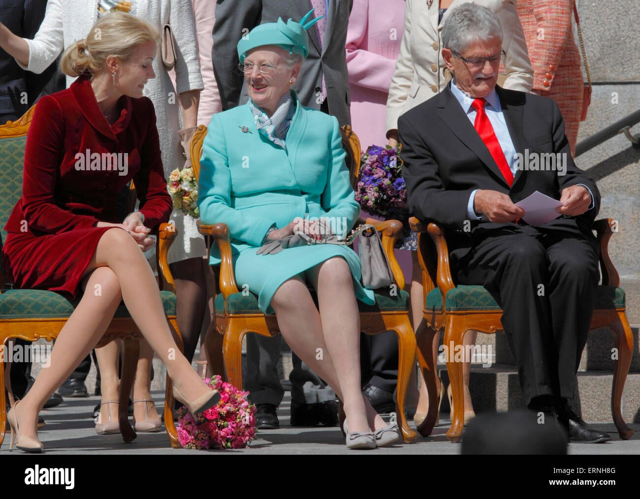 Copenhagen, Denmark, 5th June, 2015. Prime Minister Helle Thorning-Schmidt, H.M. Queen Margrethe II of Denmark, and Speaker of Parliament, Mogens Lykketoft in the Christiansborg Palace yard awaiting the commemorative parade in historic garments in celebration of the 100th anniversary of the constitution amendment in 1915 that gave Danish women the right to vote and stand for election. Credit:  Niels Quist/Alamy Live News Stock Photo