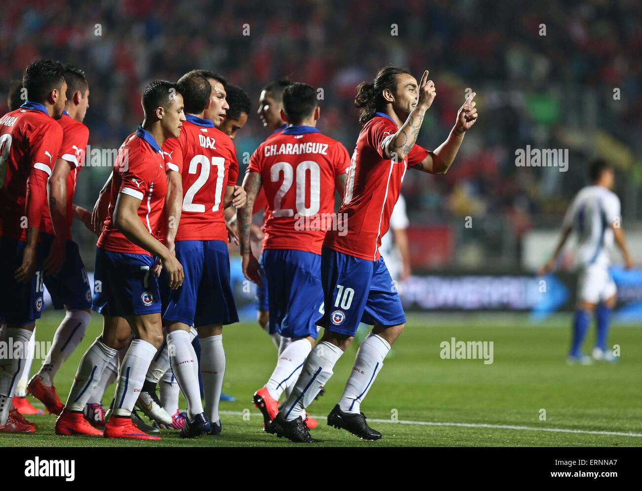 Rancagua, Chile. 5th June, 2015. Image provided by Chile's National Association of Professional Soccer (ANFP) shows Chile's Jorge Valdivia (R) celebrating his goal during a friendly match at the El Teniente Stadium in Rancagua, Chile, on June 5, 2015. Credit:  ANFP/Xinhua/Alamy Live News Stock Photo