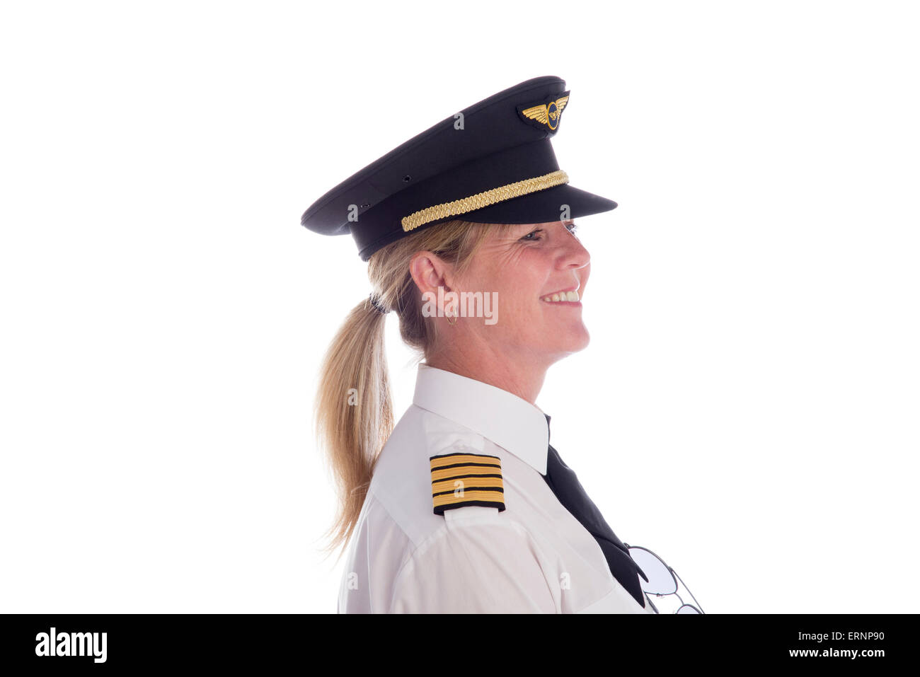 Attractive mid age female airline pilot in uniform Stock Photo - Alamy