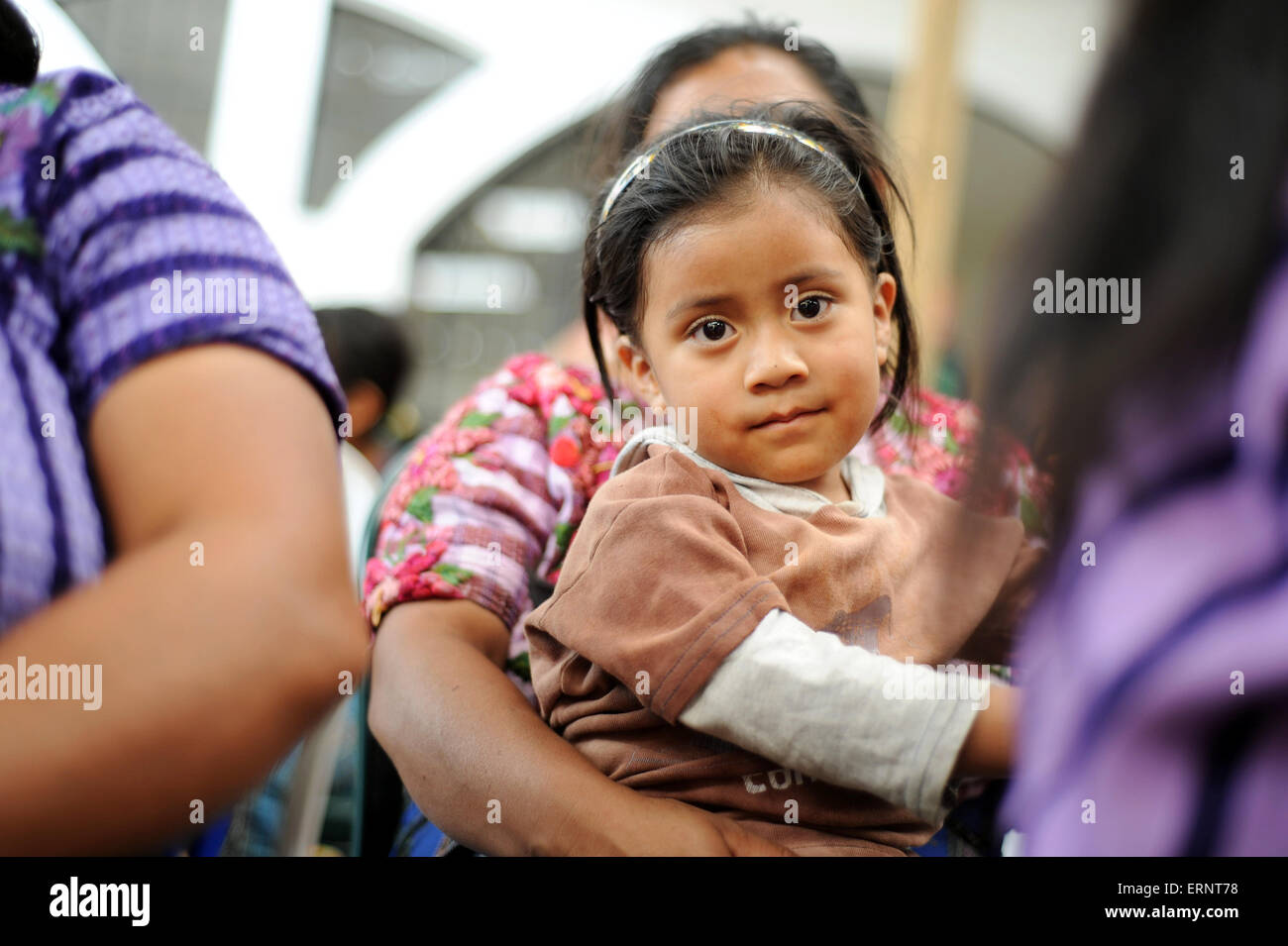 Guatemala maya indigenous girl with her mother in Panajachel, Solola, Guatemala. Stock Photo