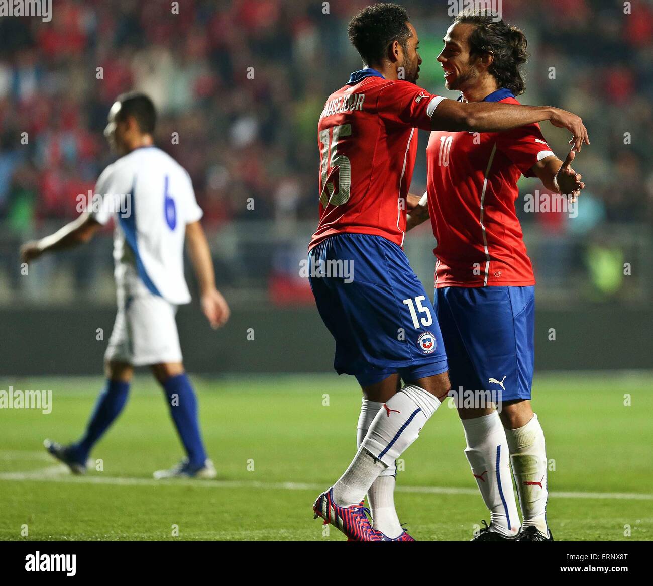 Rancagua, Chile. 5th June, 2015. Image provided by Chile's National Association of Professional Soccer (ANFP) shows Chile's Jean Beausejour (L) and Jorge Valdivia (R) celebrating a goal during a friendly match with El Salvador in Rancagua, Chile, on June 5, 2015. © ANFP/Xinhua/Alamy Live News Stock Photo