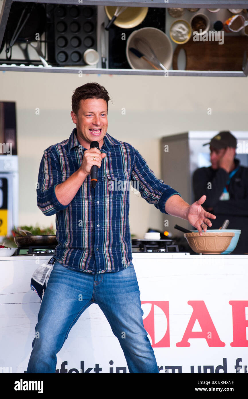 Jamie Oliver doing a cooking demo for Jamie Olivers Food Tube at Big Feastival 2014 Stock Photo