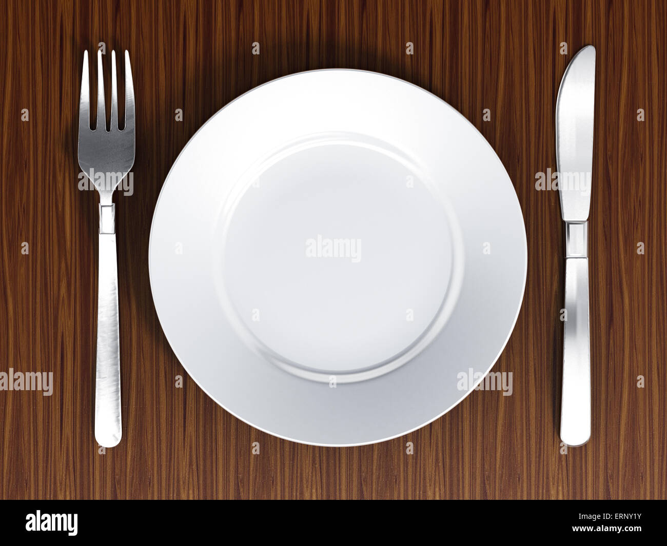 Dinner plate, fork and knife on wood surface Stock Photo Alamy