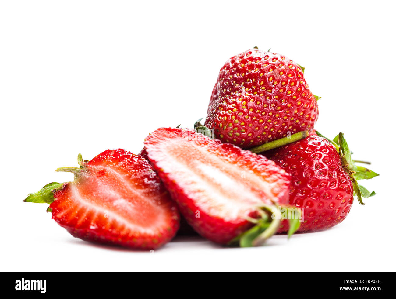 ripe strawberries closeup isolated on white background Stock Photo - Alamy