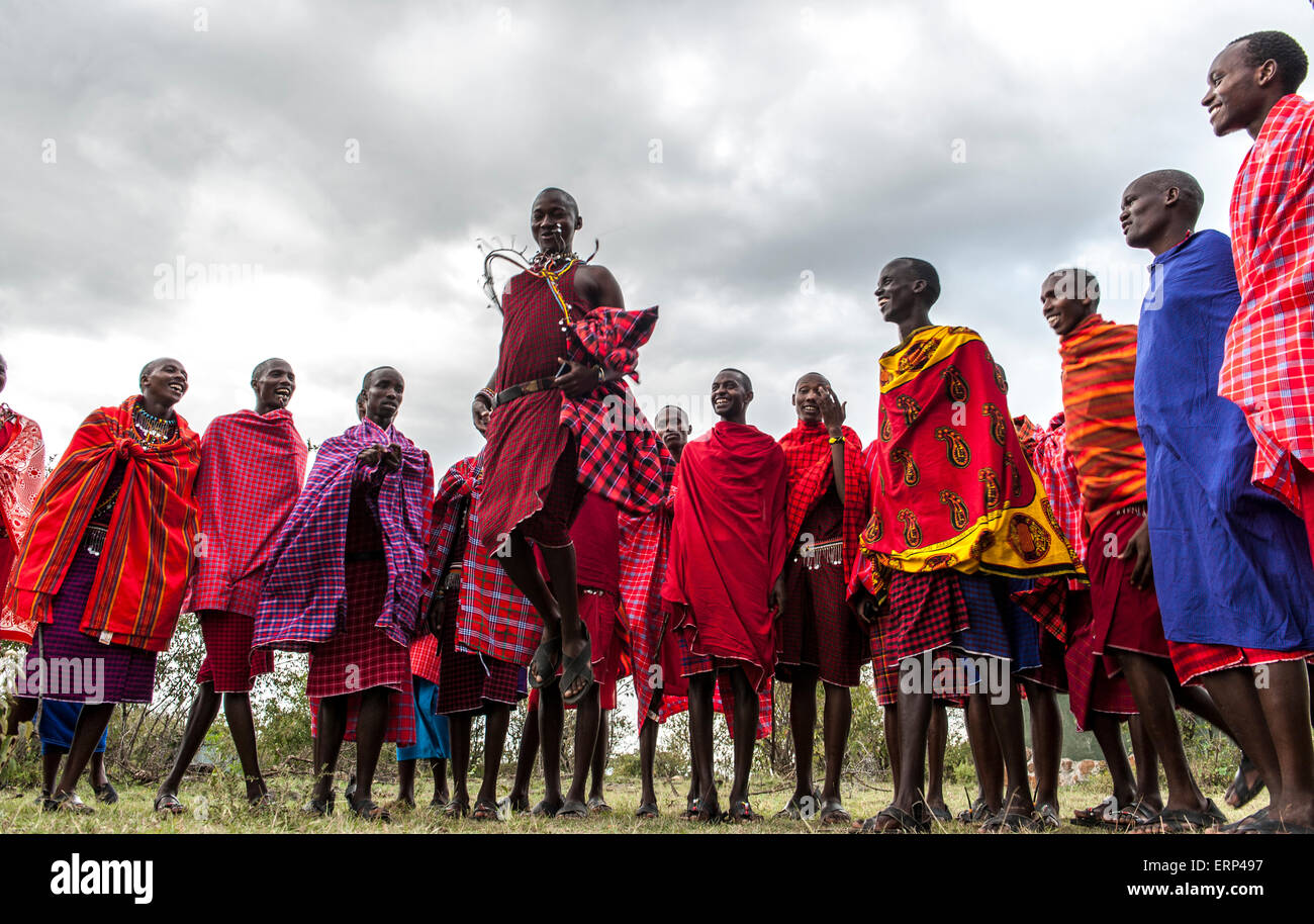 Traditional jumping dance Maasai people Mara Naboisho conservancy Kenya Africa Stock Photo