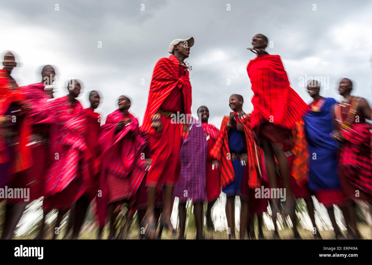 Traditional jumping dance Maasai people Mara Naboisho conservancy Kenya Africa Stock Photo