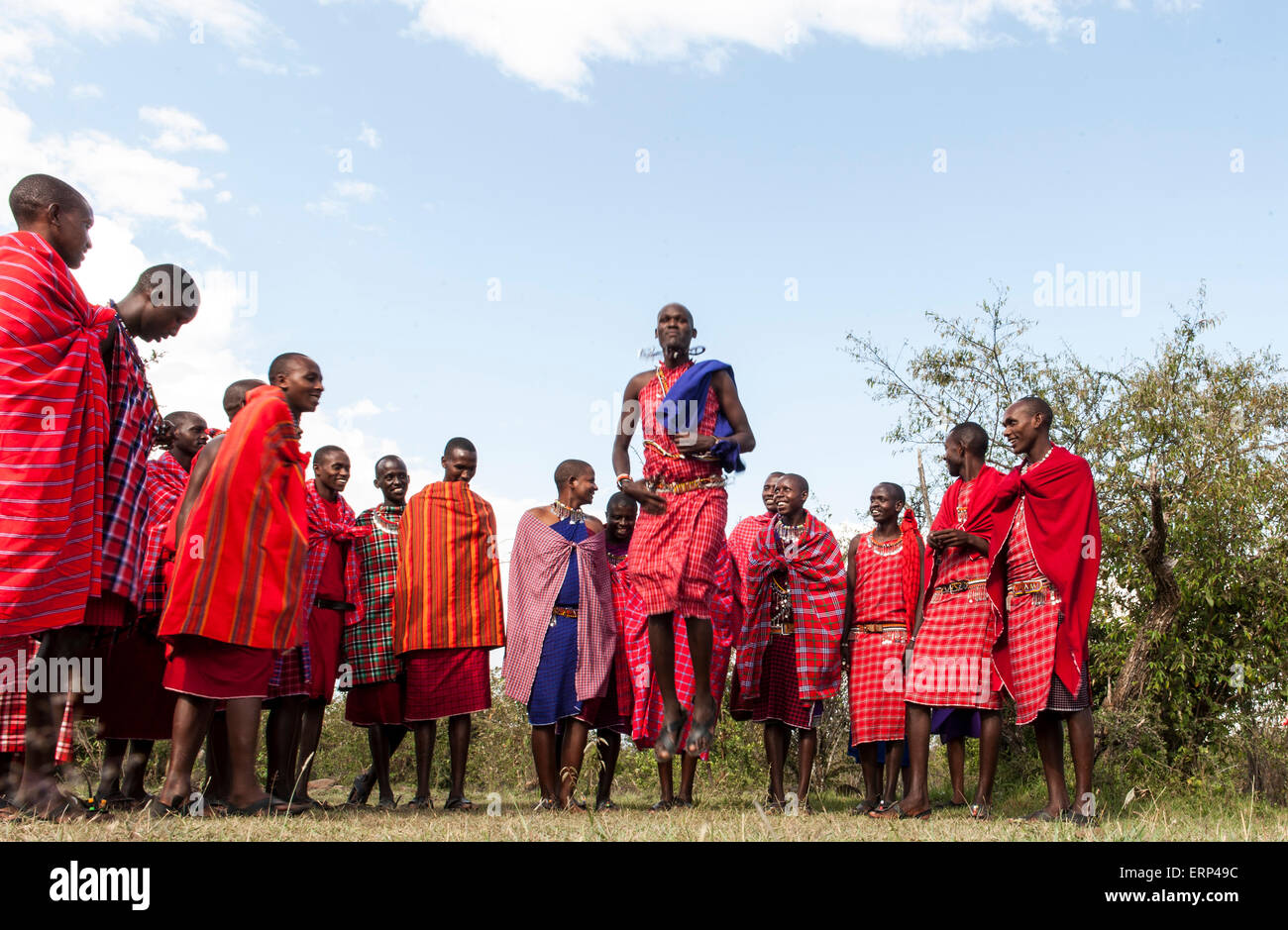 Traditional jumping dance Maasai people Mara Naboisho conservancy Kenya Africa Stock Photo