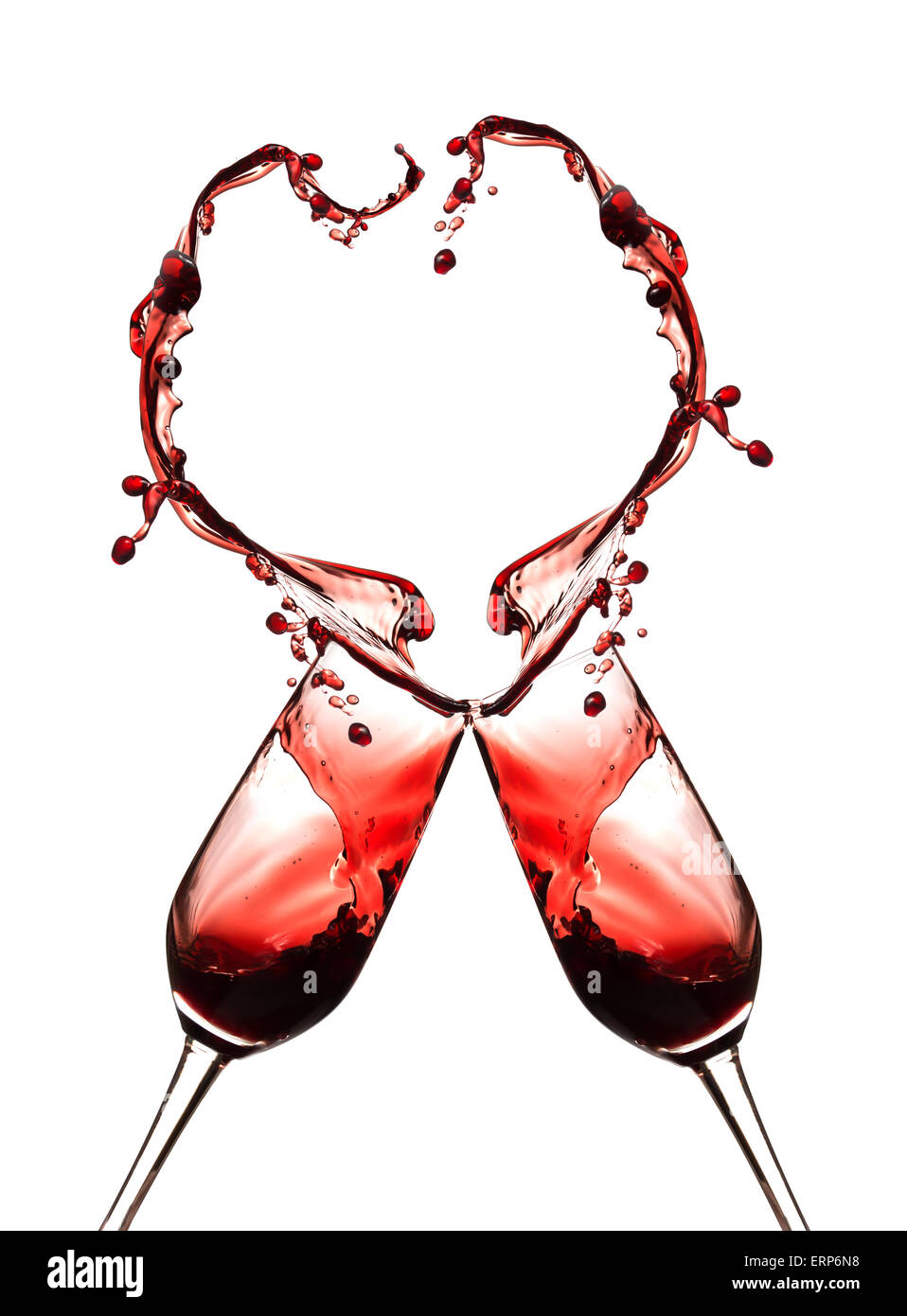 Abstract heart from red wine splashing. Stock Photo