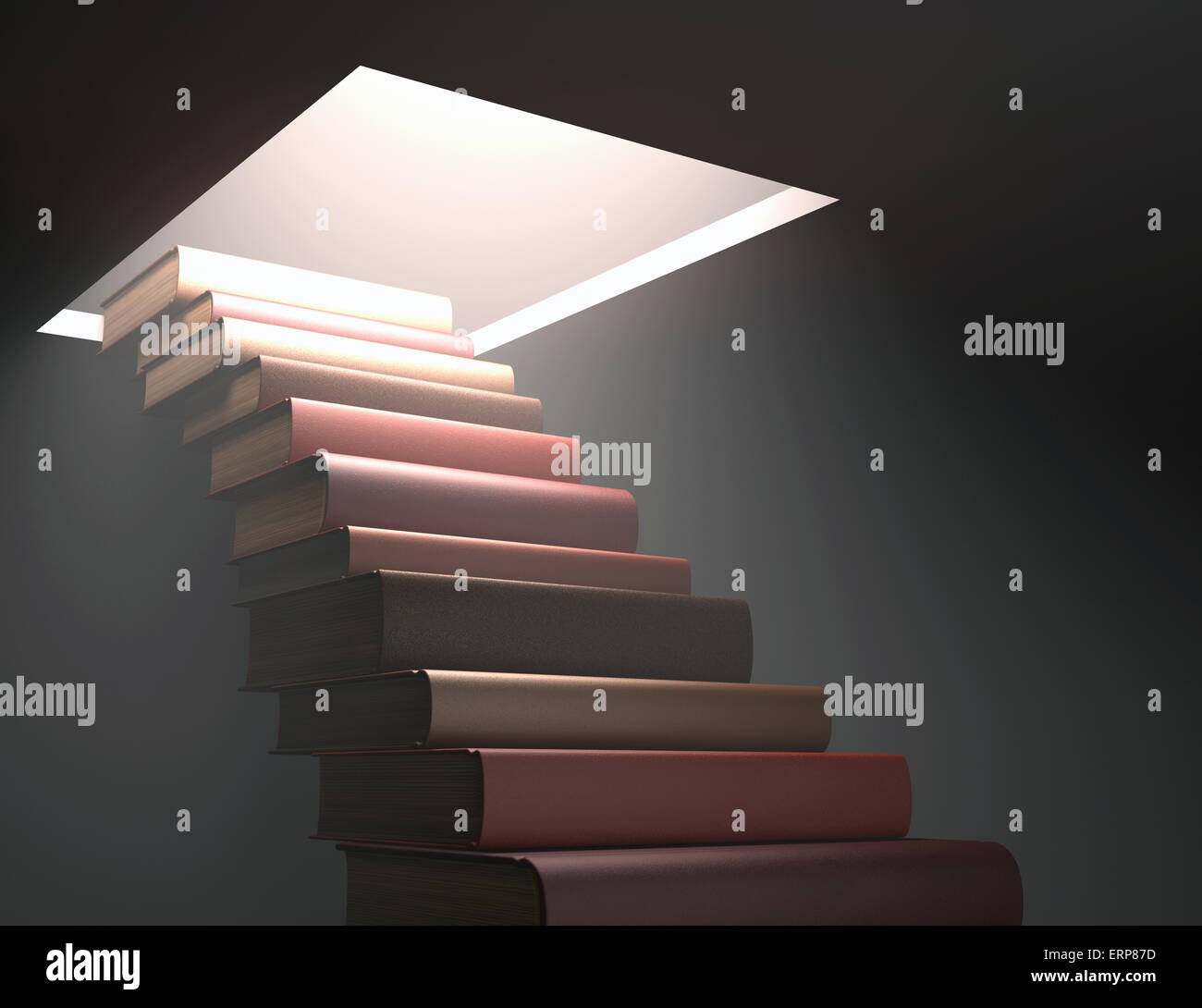 Books stacked ladder shaped on a concept of knowledge and growth. Stock Photo