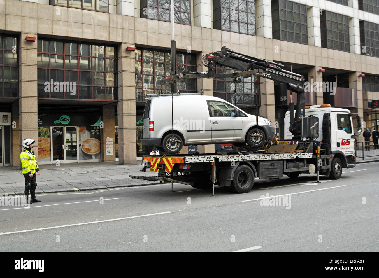 Van being removed from illegal parking, London, England. Stock Photo