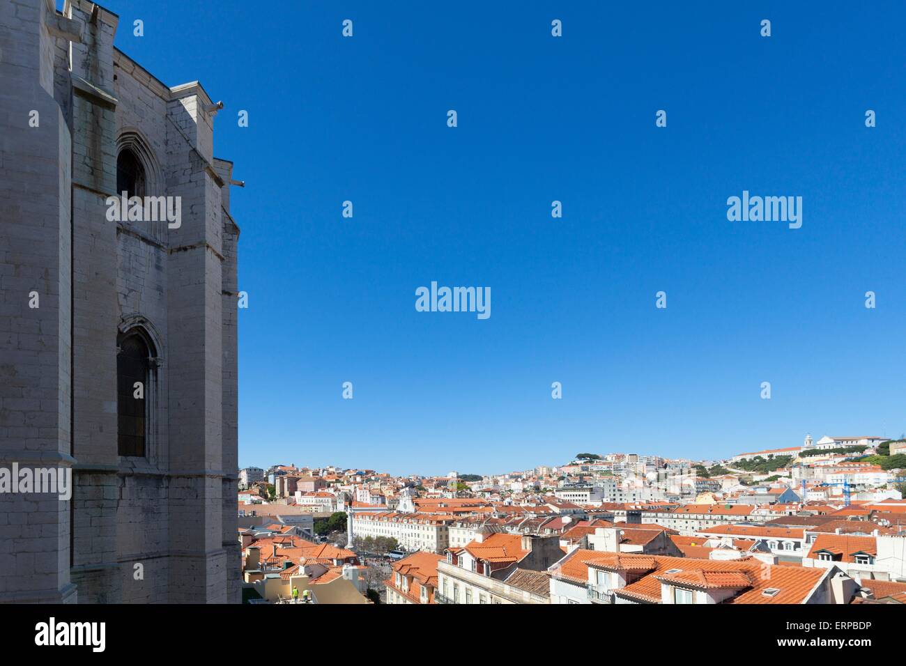 A view over the red rooftops of Lisbon city from beside the Convento do Carmo Cathedral. Stock Photo