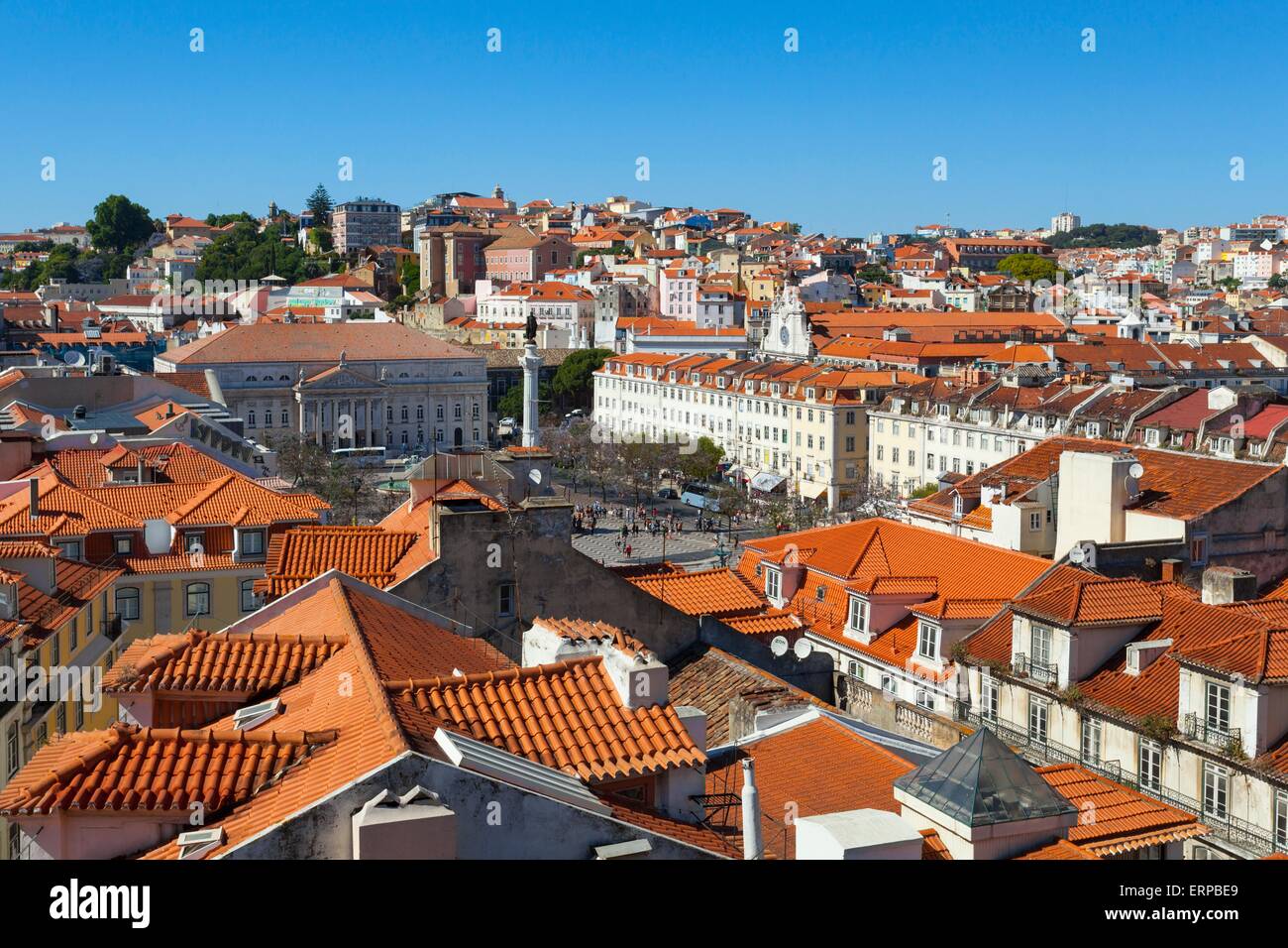A view over the red rooftops of Lisbon city, the capital city of Portugal from the heights of the Funicular Elevador de Santa Ju Stock Photo