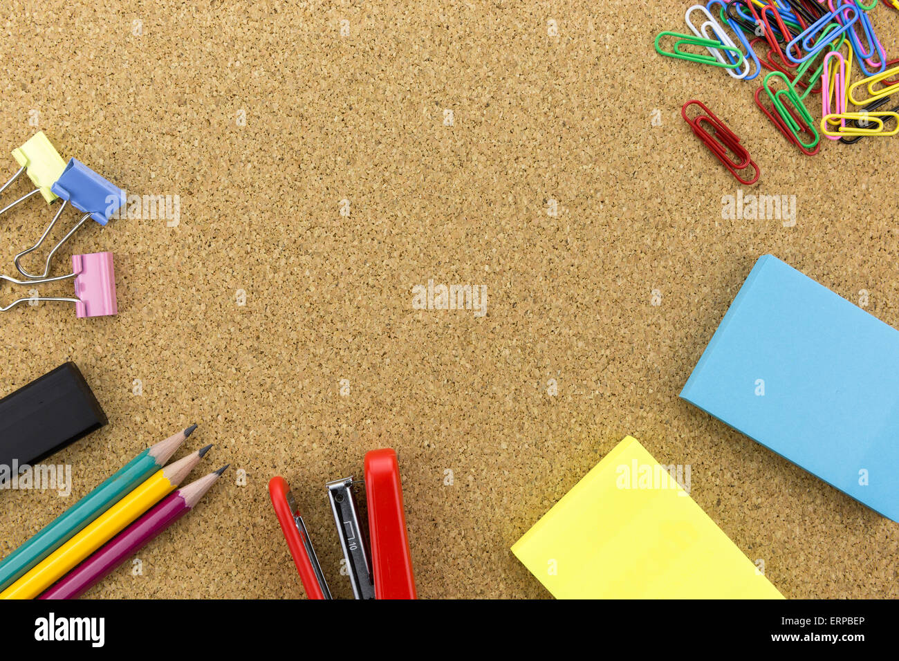 wallpaper stationary on cork board with many office supplies tools