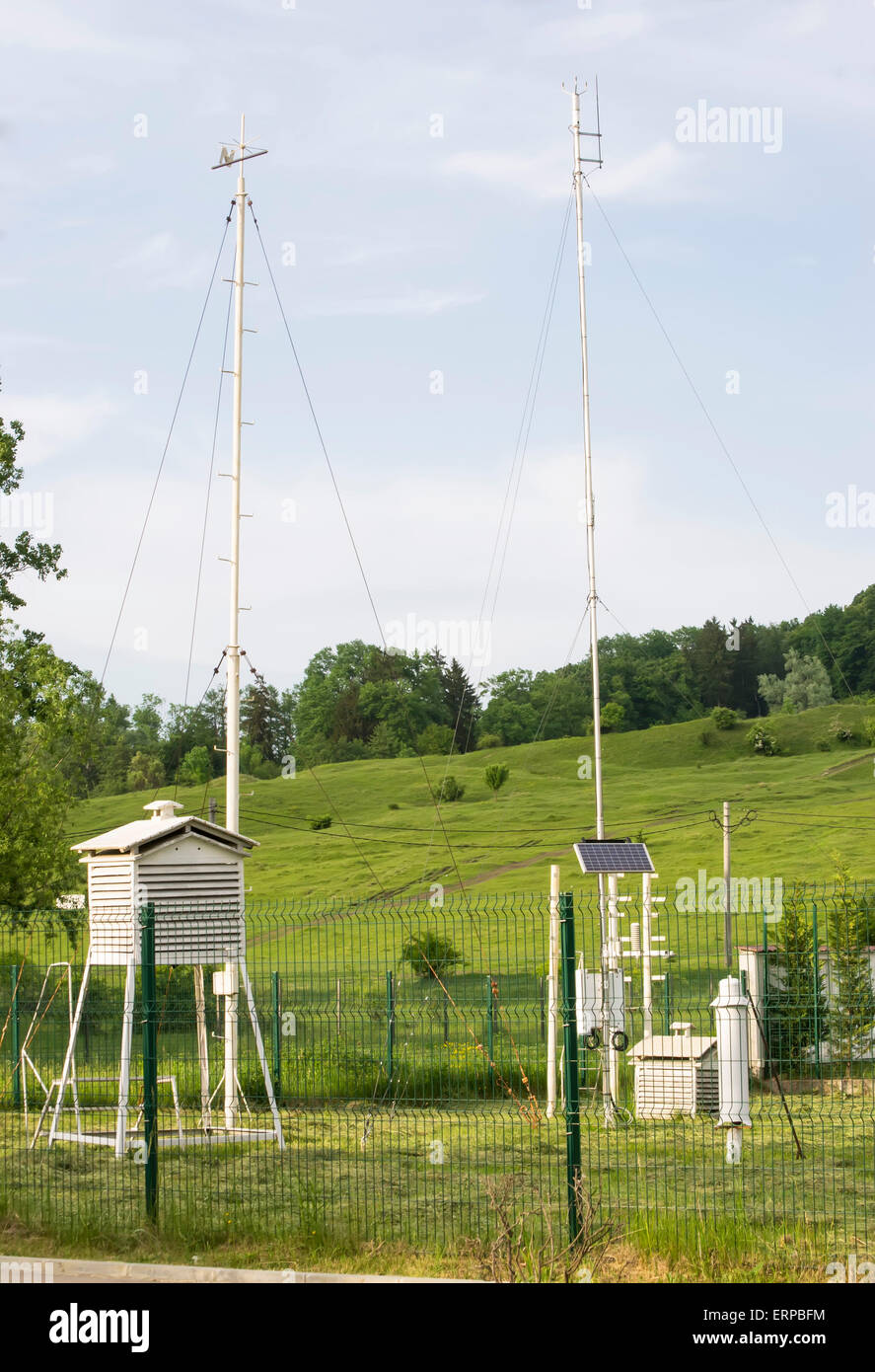 Weather station with instruments placed in a hilly area of temperate climate Stock Photo
