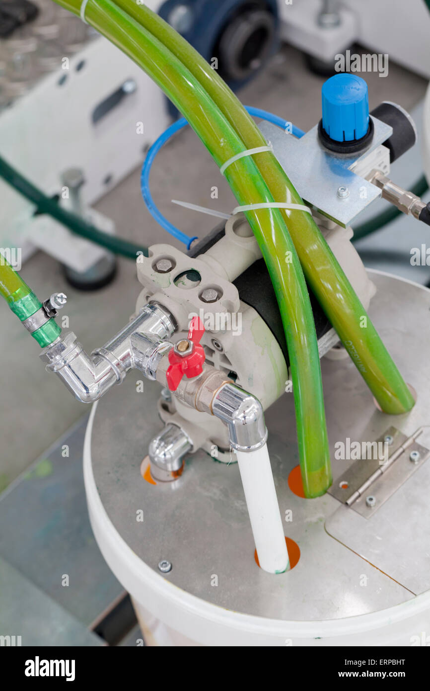 bucket with a pump dispenser for color printing machine Stock Photo Alamy