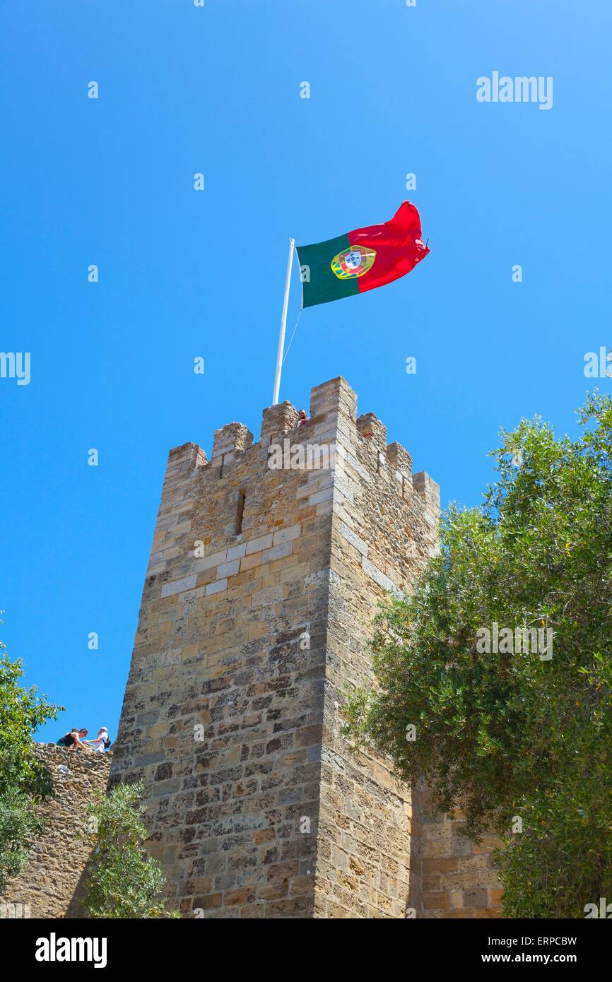 The Portuguese flag flying on a tower at the Castelo de Sao Jorge in Lisbon Stock Photo