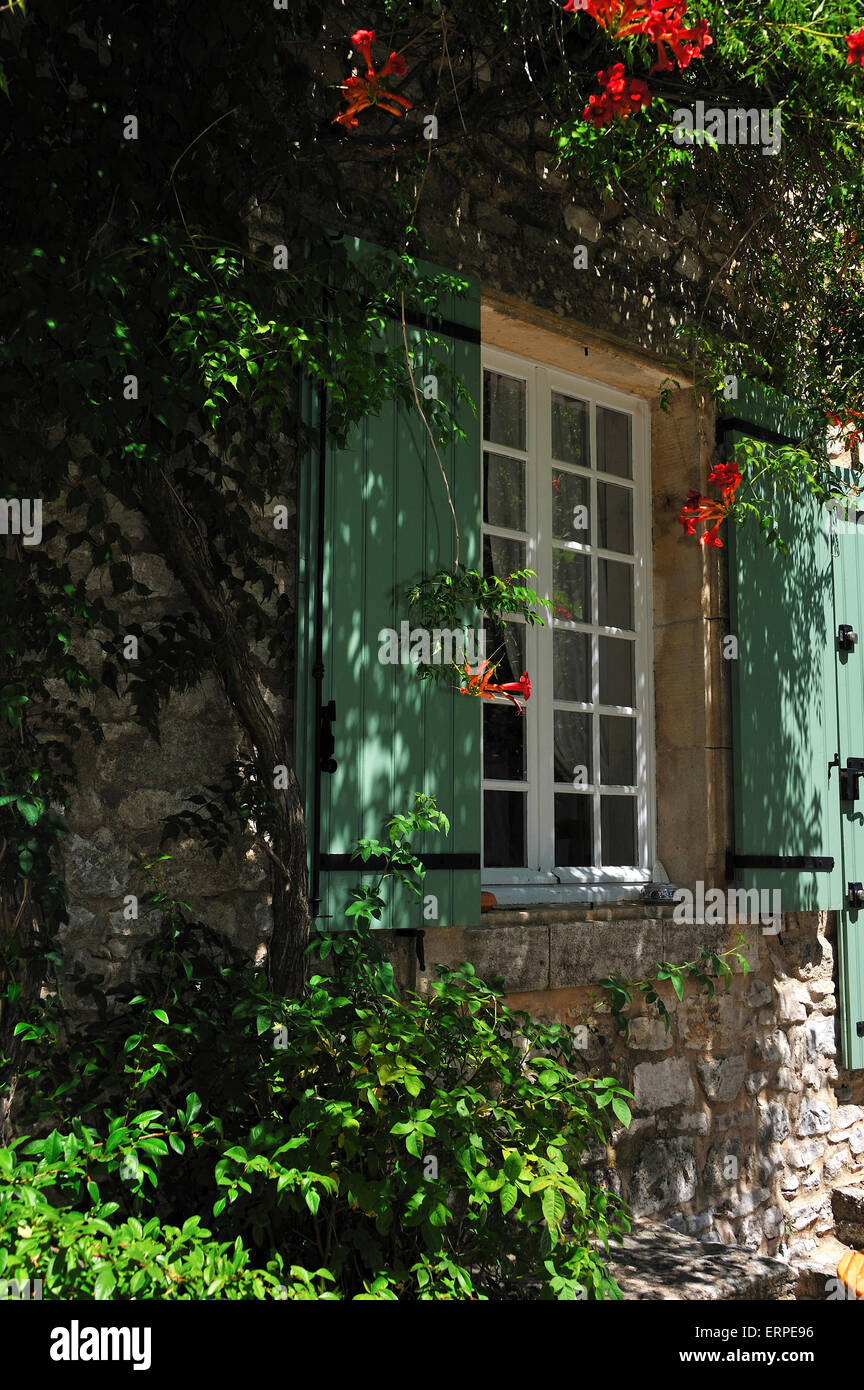 Picturesque window and lane in the village Joucas, Provence Stock Photo