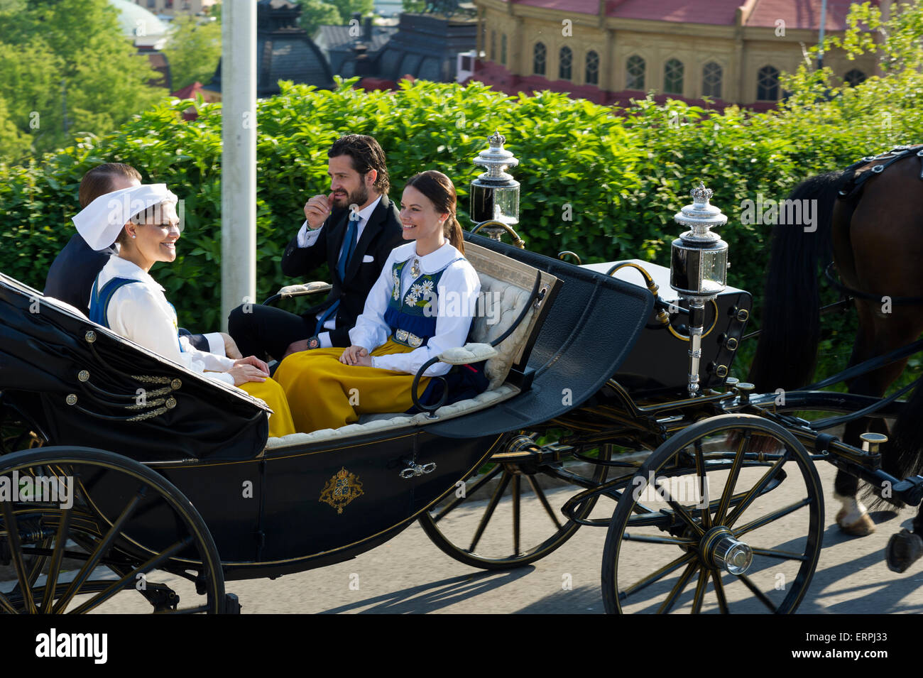 Stockholm, Sweden, 6th June, 2015. The National Day of Sweden. Festivities at Solliden stage, Stockholm, in the presence of the Royal Family. Princess Victoria, Prince Daniel, Miss Sofia Hellqvist and Prince Carl Philip arrives by carriage to Solliden. Credit: Barbro Bergfeldt Alamy Live News Stock Photo