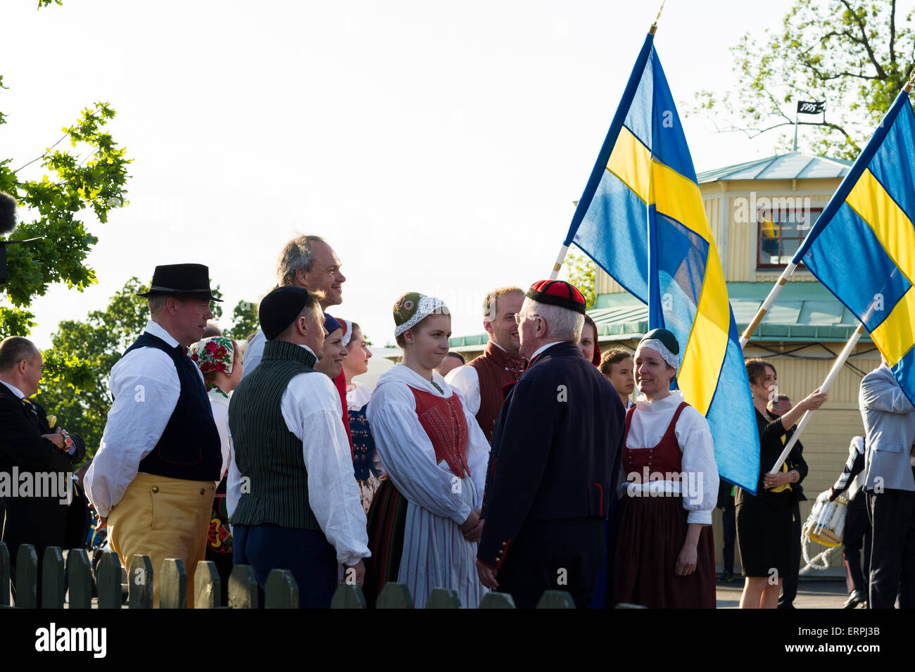 Stockholm, Sweden, 6th June, 2015. The National Day of Sweden. Festivities at Solliden stage, Stockholm, in the presence of the Royal Family. 6th of June is celebrated in traditional fashion: His and Her Majesty the King and Queen join the procession to Skansen where there are speeches‚ flag ceremony‚ singing‚ brass bands and folk music. Credit: Barbro Bergfeldt Alamy Live News Stock Photo