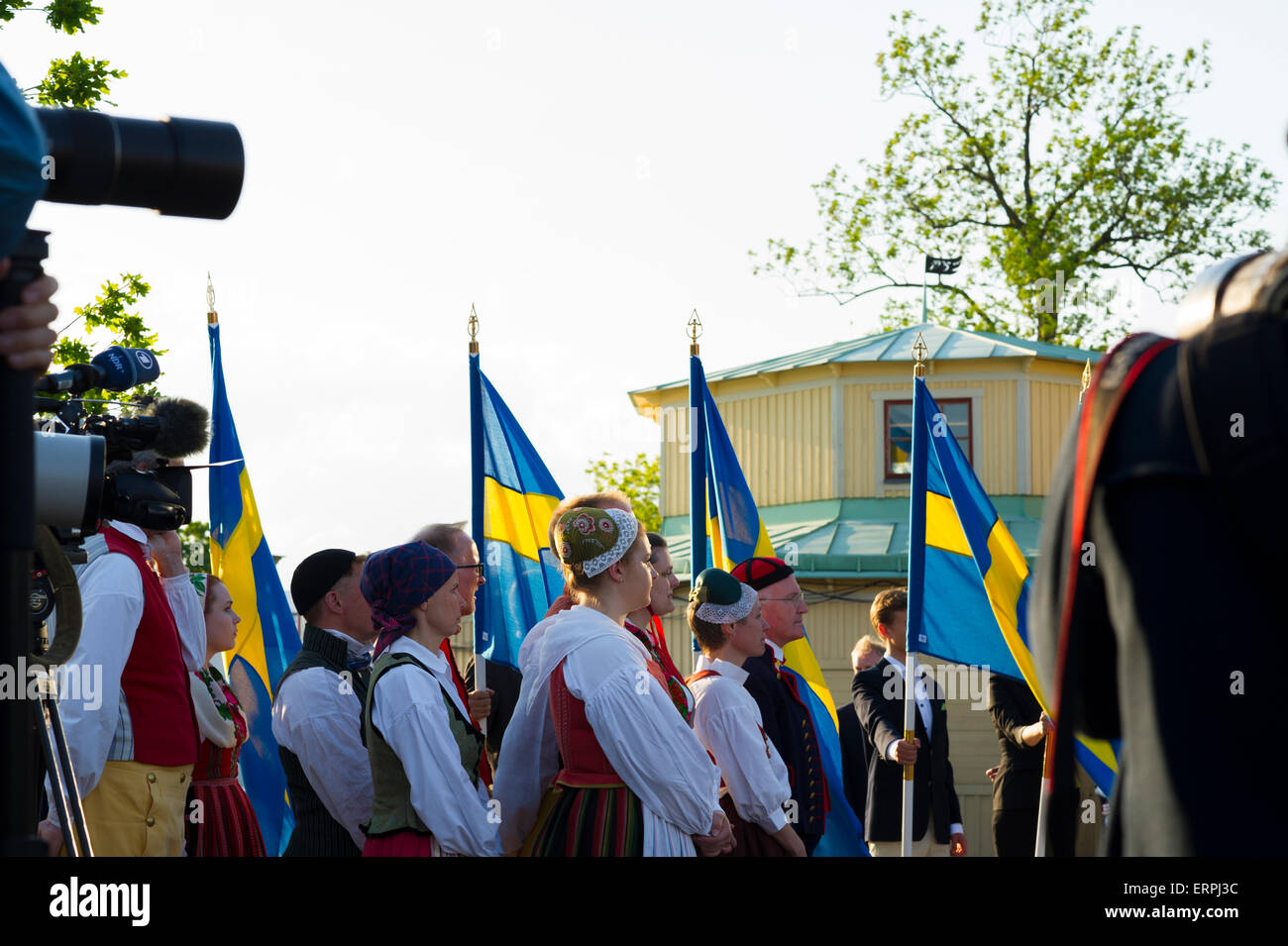 Stockholm, Sweden, 6th June, 2015. The National Day of Sweden. Festivities at Solliden stage, Stockholm, in the presence of the Royal Family. 6th of June is celebrated in traditional fashion: His and Her Majesty the King and Queen join the procession to Skansen where there are speeches‚ flag ceremony‚ singing‚ brass bands and folk music. Credit: Barbro Bergfeldt Alamy Live News Stock Photo