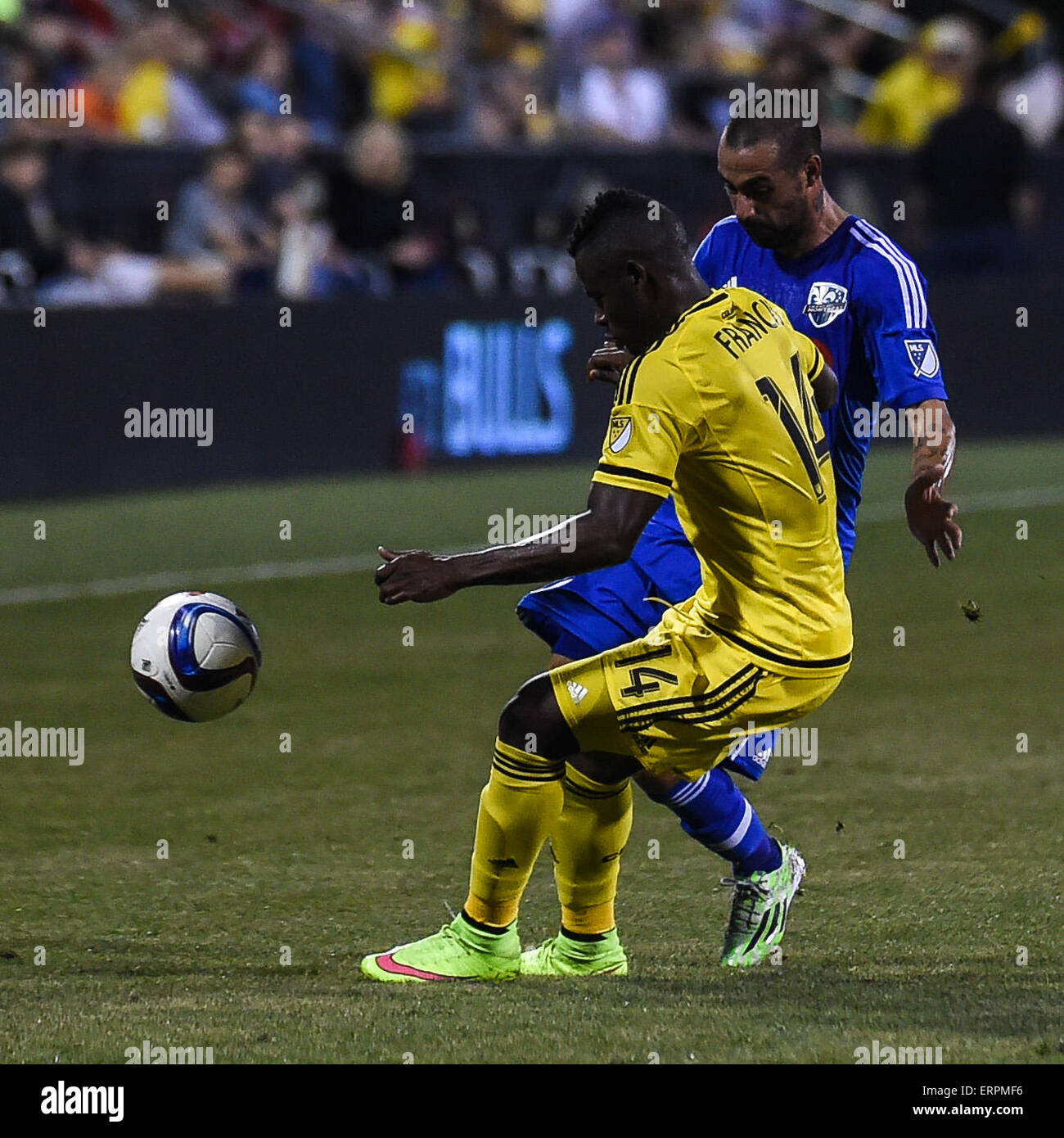 Columbus, USA. 6th June, 2015. Columbus Crew SC defender Waylon Francis (yellow) and Montreal Impact forward Andres Romero (blue) fight for the ball during a regular season match between Columbus Crew SC and Montreal Impact FC at Mapfre Stadium in Columbus, OH. Credit:  Brent Clark/Alamy Live News Stock Photo