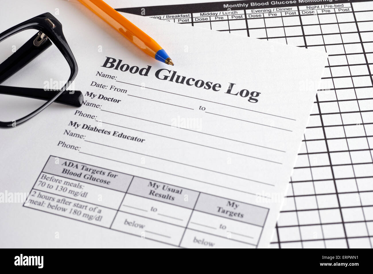 blood-glucose-log-and-monthly-blood-glucose-monitoring-diary-with-ballpoint-pen-and-glasses-stock-photo-alamy