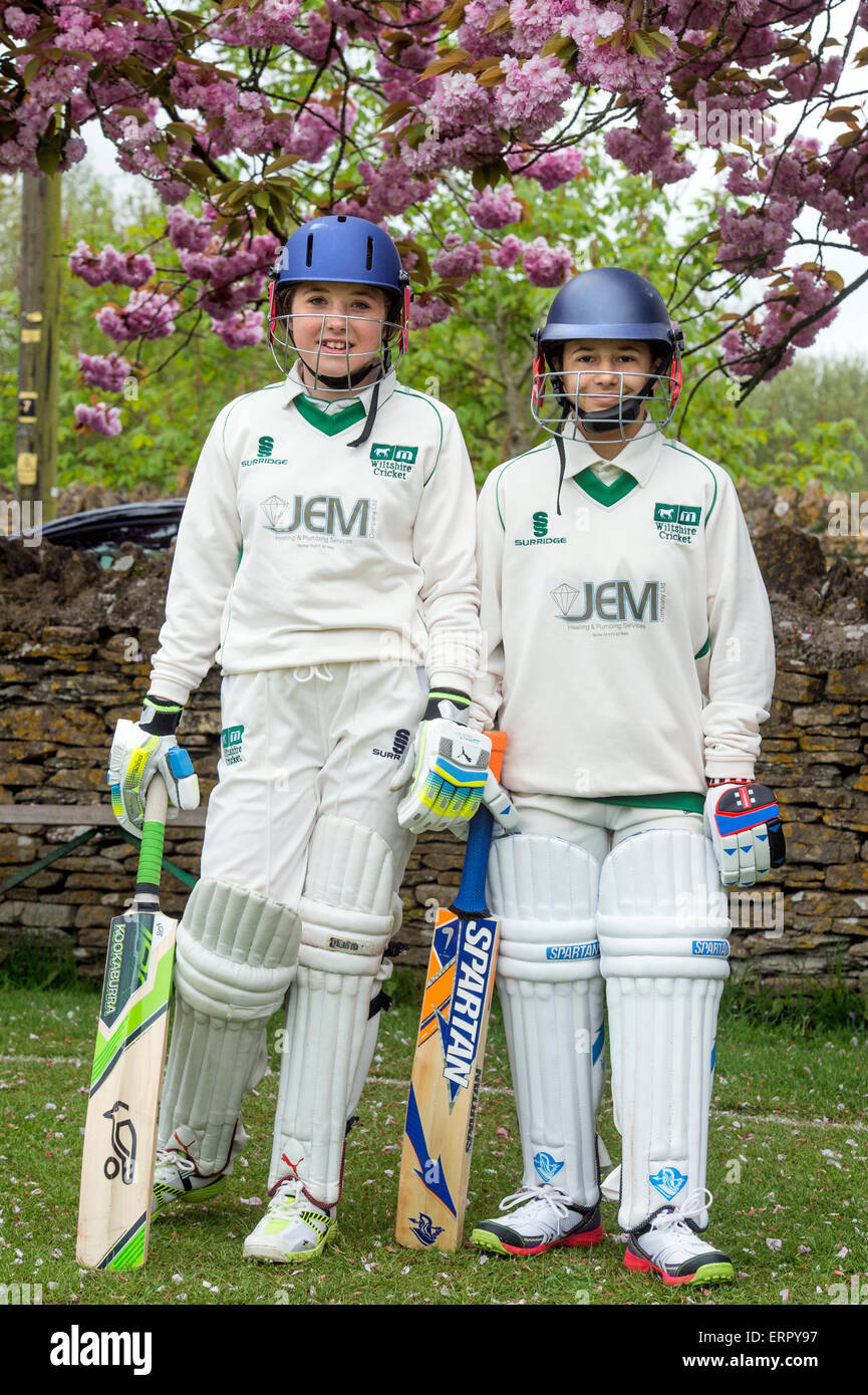Junior girls about to open the batting in a girls cricket match in